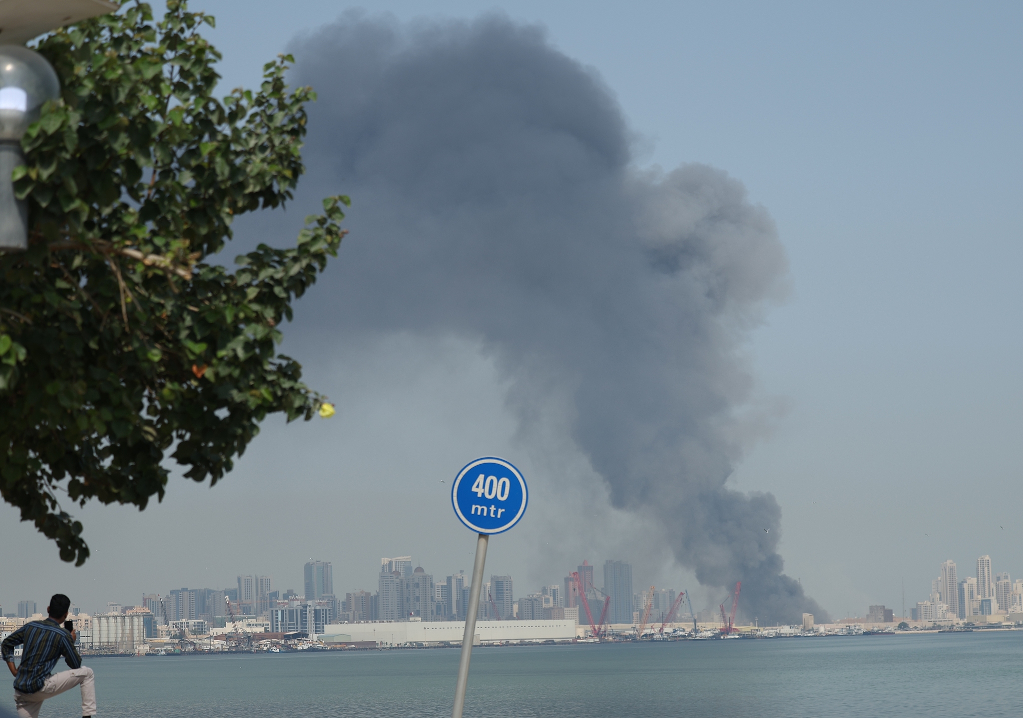 Smoke rises after Iran carried out a missile strike on the main headquarters of the U.S. Navy 5th Fleet in Manama in retaliation against U.S.-Israeli attacks, in Bahrain February 28, 2026. /VCG