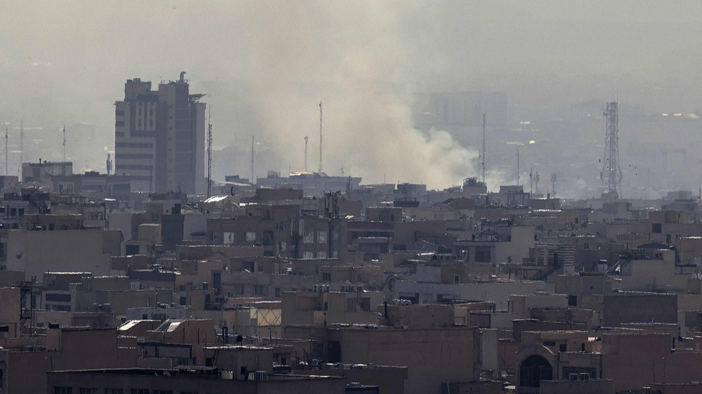 A plume of smoke rises following an explosion in Tehran, Iran, February 28, 2026. /VCG