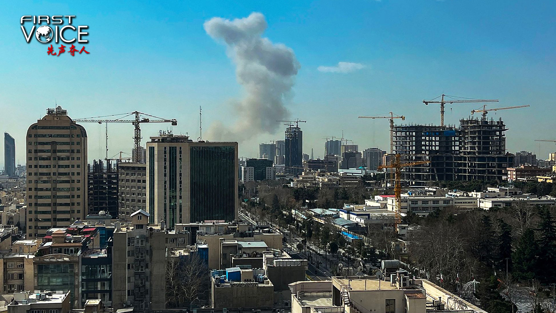 A plume of smoke rises following explosions in Tehran, February 28, 2026. Israel's defence ministry announced February 28 it had launched a 
