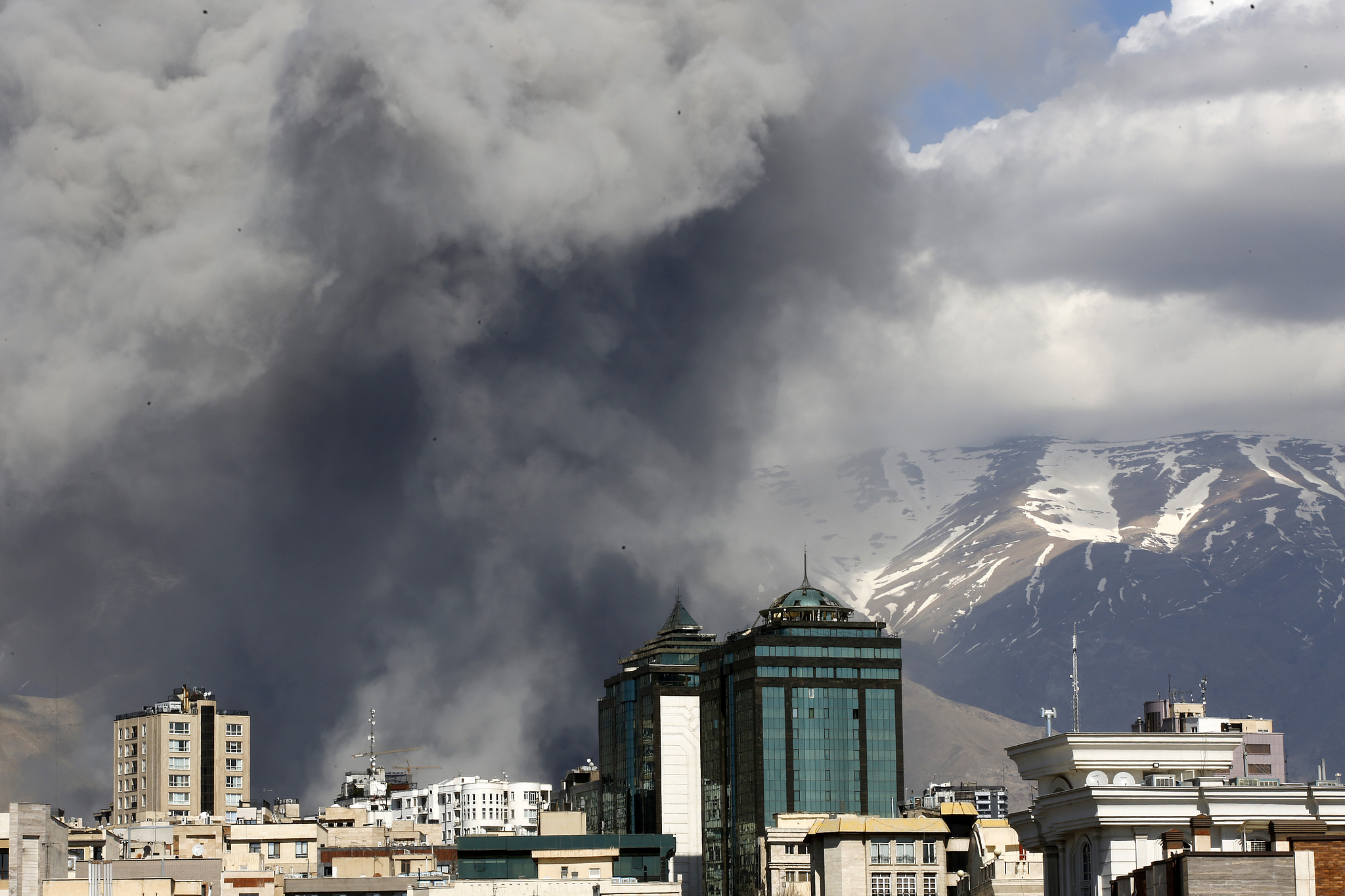 Smoke rises from the area after it was targeted in attacks as a series of explosions are heard in Tehran, Iran, on March 1, 2026. /VCG