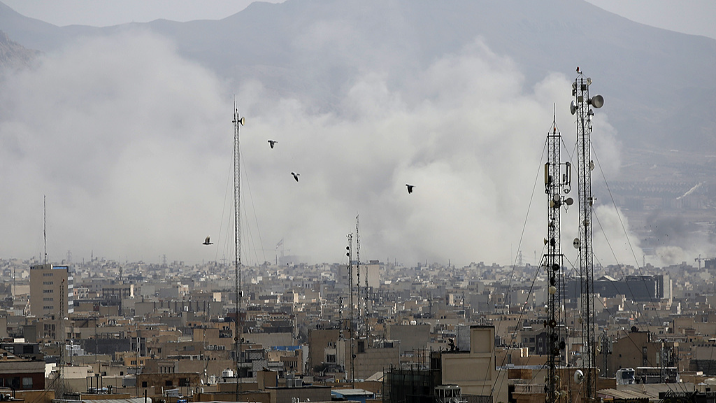 Smoke rises over the city after the Israeli military launches 2nd wave of airstrikes, Tehran, Iran, February 28, 2026. /VCG