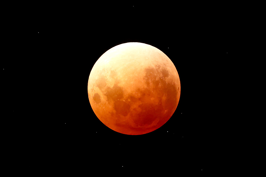 The moon orbits through the Earth's shadow resulting in a lunar eclipse, Auckland, New Zealand, March 3, 2026. /VCG