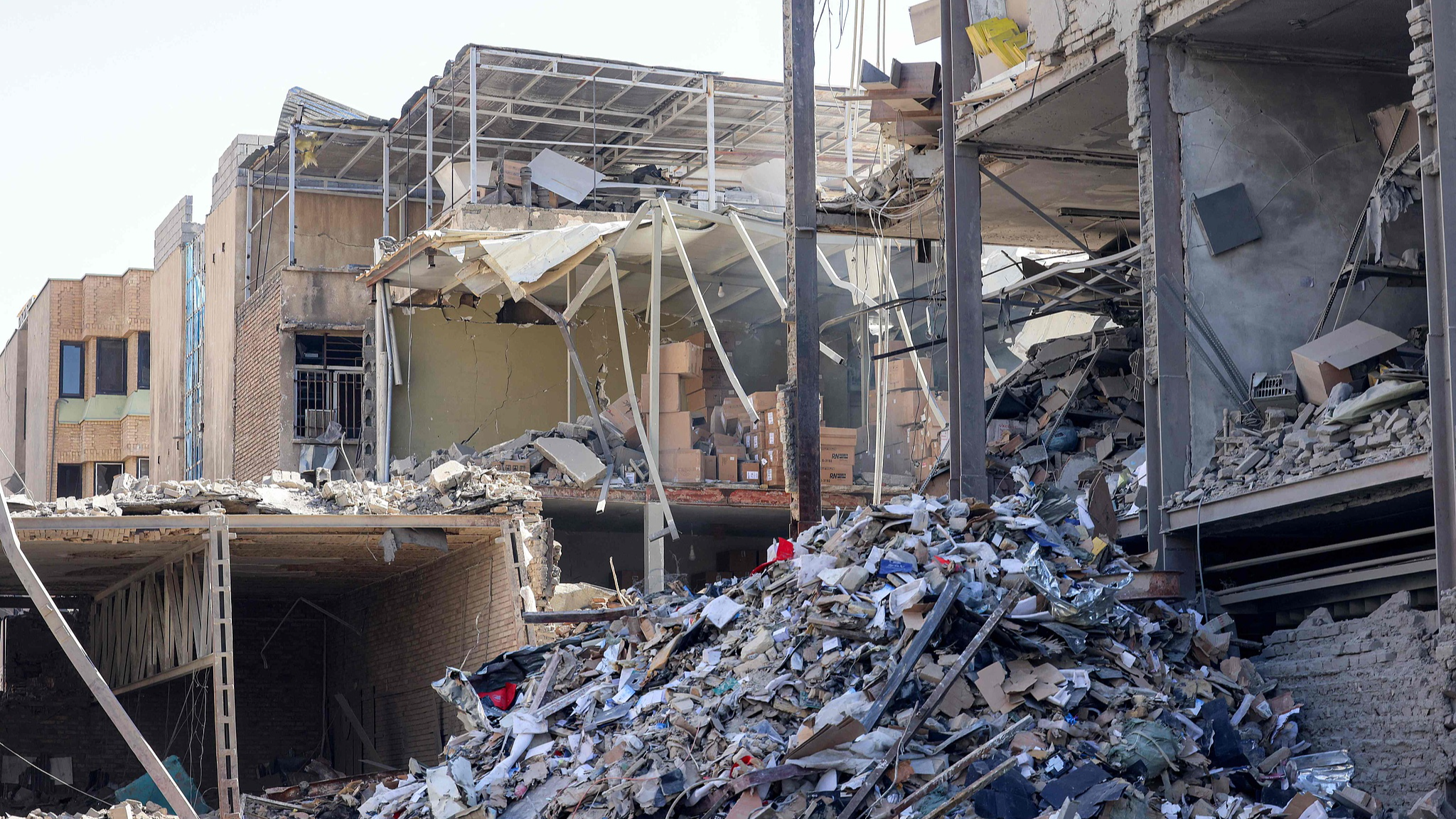 The rubble from a destroyed building is pictured near Ferdowsi square in Tehran, March 3, 2026. /VCG
