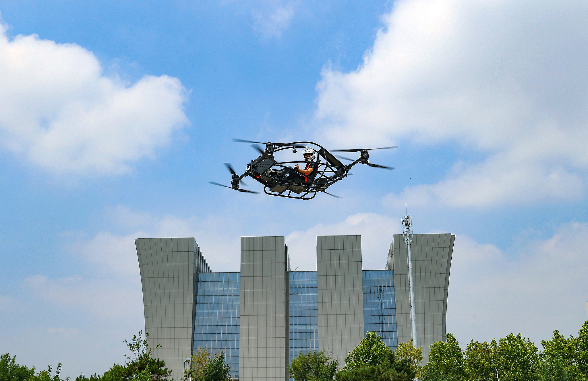 A team conducts testing and flight debugging of a crewed eVTOL aircraft in Dongying, Shandong Province, east China, July 8, 2025. /VCG