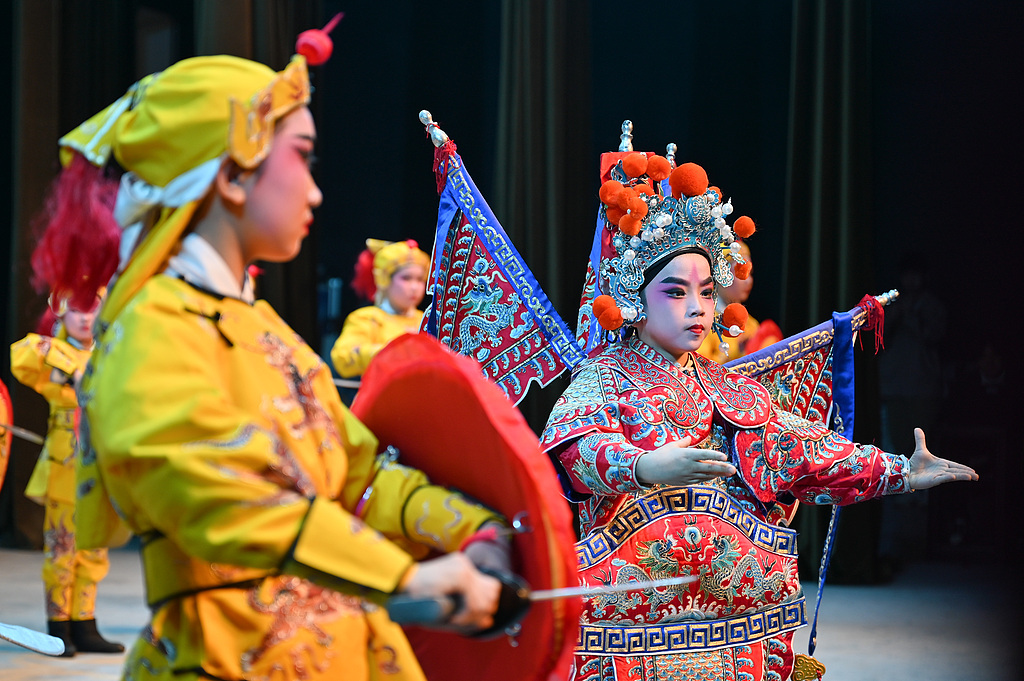 Young Cantonese Opera enthusiasts perform at the Cantonese Opera Art Museum in Guangzhou on February 5, 2026. /VCG