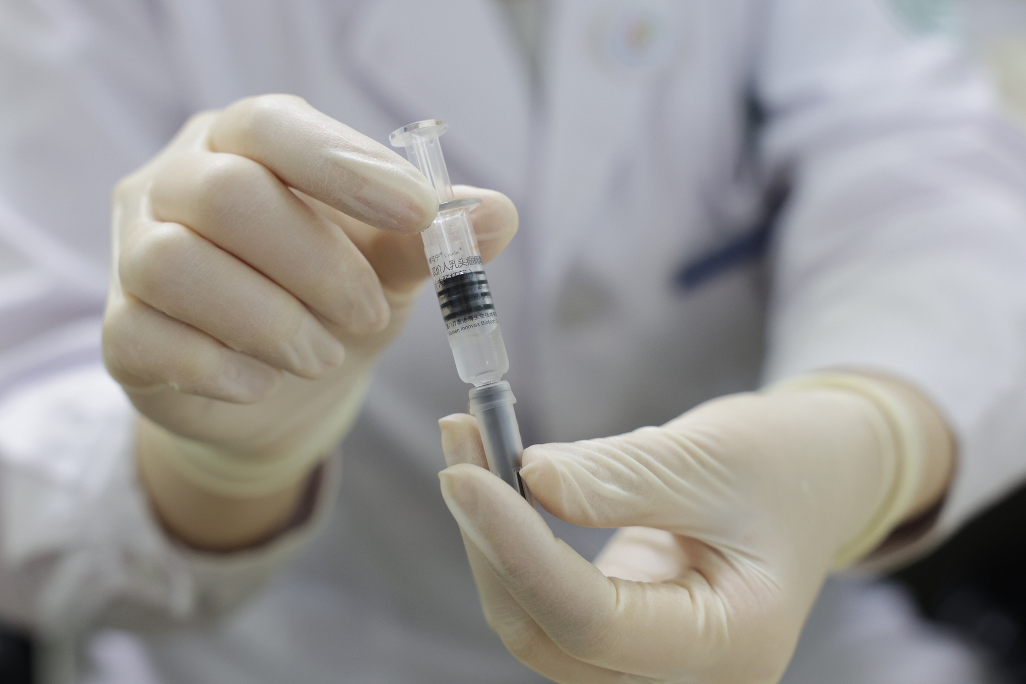 A doctor displays a sample of HPV vaccines in Beijing, China, September 6, 2025. /VCG