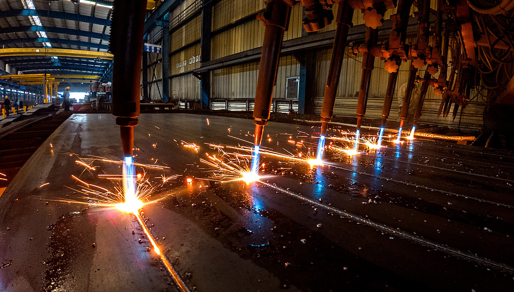 A local steel workshop in Zhijiang City, Hubei Province, machines operate with production lines running at full capacity, February 24, 2026. /VCG