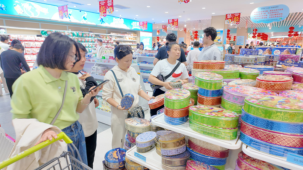 People shop at a supermarket in Huai'an City, east China's Jiangsu Province, March 2, 2026. /VCG