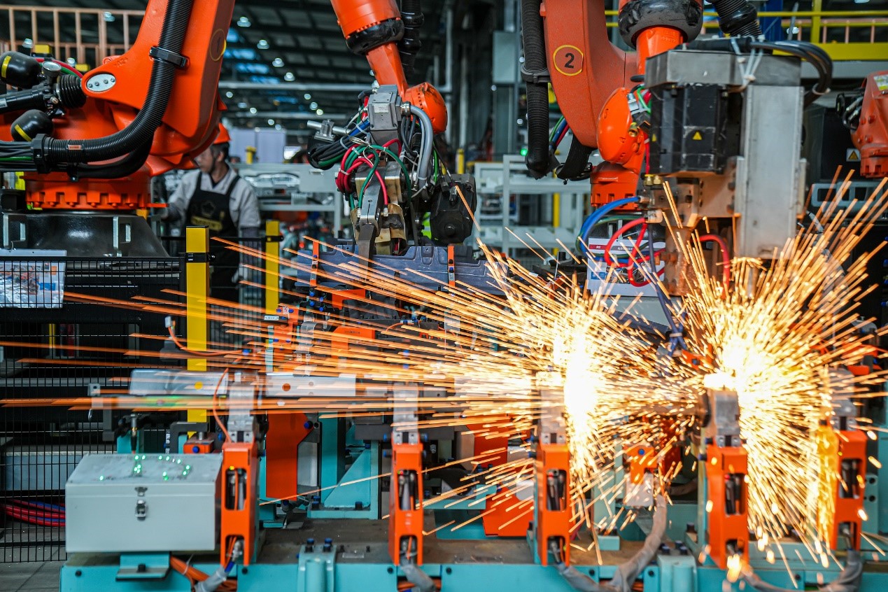 Industrial robots manufacture NEV components at Jinhua Zhixin Technology Co., Ltd. in Jinhua, Zhejiang Province, China, February 26, 2026. /VCG