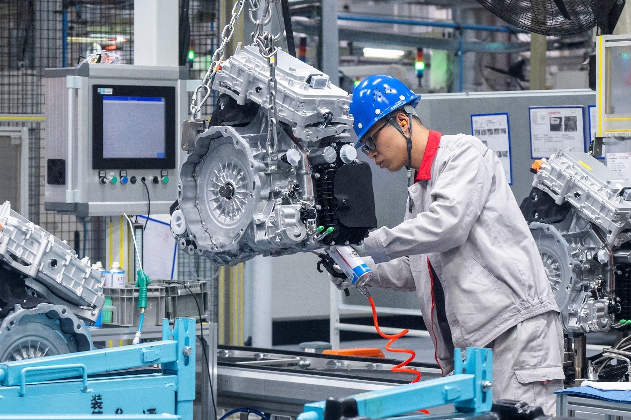 Workers assemble NEV transmissions on an intelligent production line at Wuhu ACTECO Power System Co., Ltd. in Wuhu, Anhui Province, China, February 24, 2026. /VCG