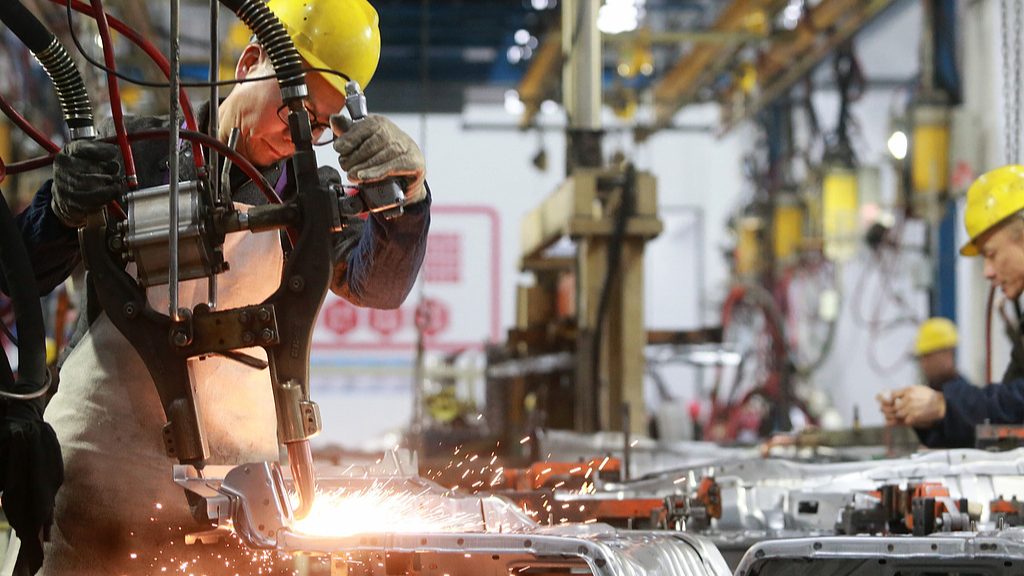 Workers operate on the production line at an auto parts manufacturer in a high-tech industrial park, Yangzhou City, east China's Jiangsu Province, February 24, 2026. /VCG
