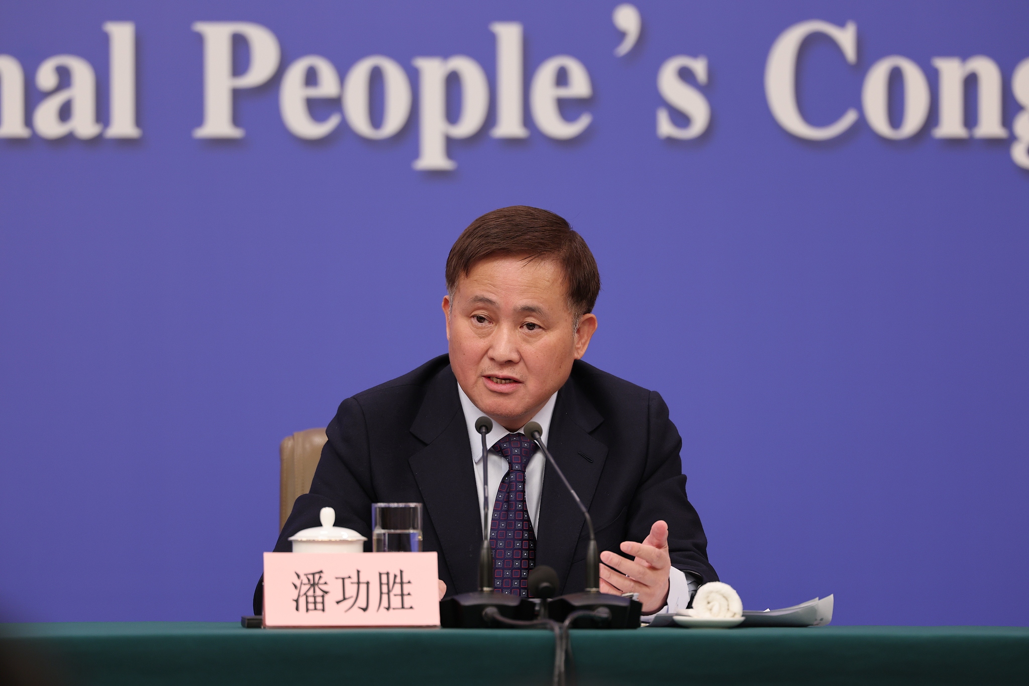 Pan Gongsheng, governor of the People's Bank of China (PBOC), answers questions at the Media Center in Beijing, China, March 6, 2026. /VCG