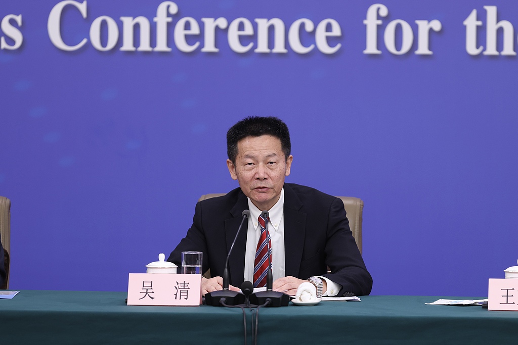 Wu Qing, Chairman of the China Securities Regulatory Commission (CSRC), answers questions at the Media Center in Beijing, March 6, 2026/ VCG
