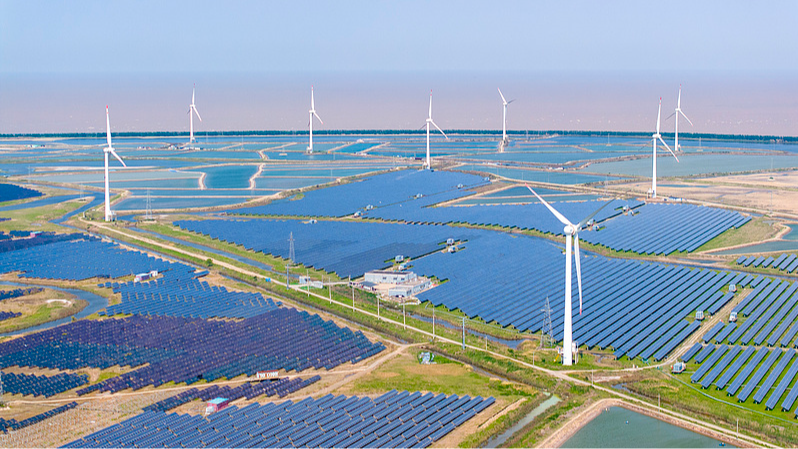 Wind turbines and photovoltaic panels together supply green energy at the 