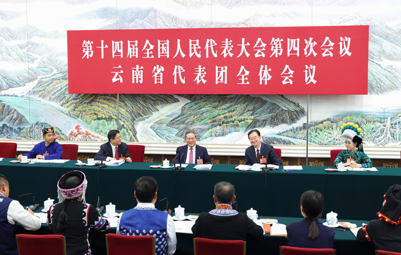 Li Qiang, a member of the Standing Committee of the Political Bureau of the Communist Party of China Central Committee and Chinese premier, joins his fellow deputies from the delegation of Yunnan Province to deliberate on the government work report at the fourth session of the 14th National People's Congress in Beijing, capital of China, March 5, 2026. /Xinhua