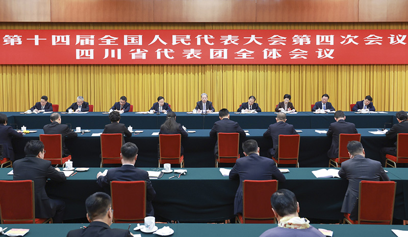 Zhao Leji, a member of the Standing Committee of the Political Bureau of the Communist Party of China Central Committee and chairman of the National People's Congress Standing Committee, takes part in a deliberation with his fellow deputies from the delegation of Sichuan Province at the fourth session of the 14th NPC in Beijing, capital of China, March 5, 2026. /Xinhua