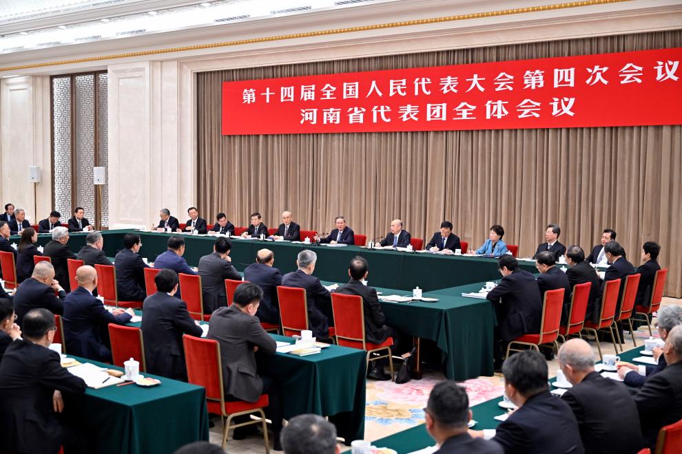 Li Qiang, a member of the Standing Committee of the Political Bureau of the Communist Party of China Central Committee and Chinese premier, joins National People's Congress (NPC) deputies from Henan Province in a group deliberation at the fourth session of the 14th NPC in Beijing, capital of China, March 6, 2026. /Xinhua