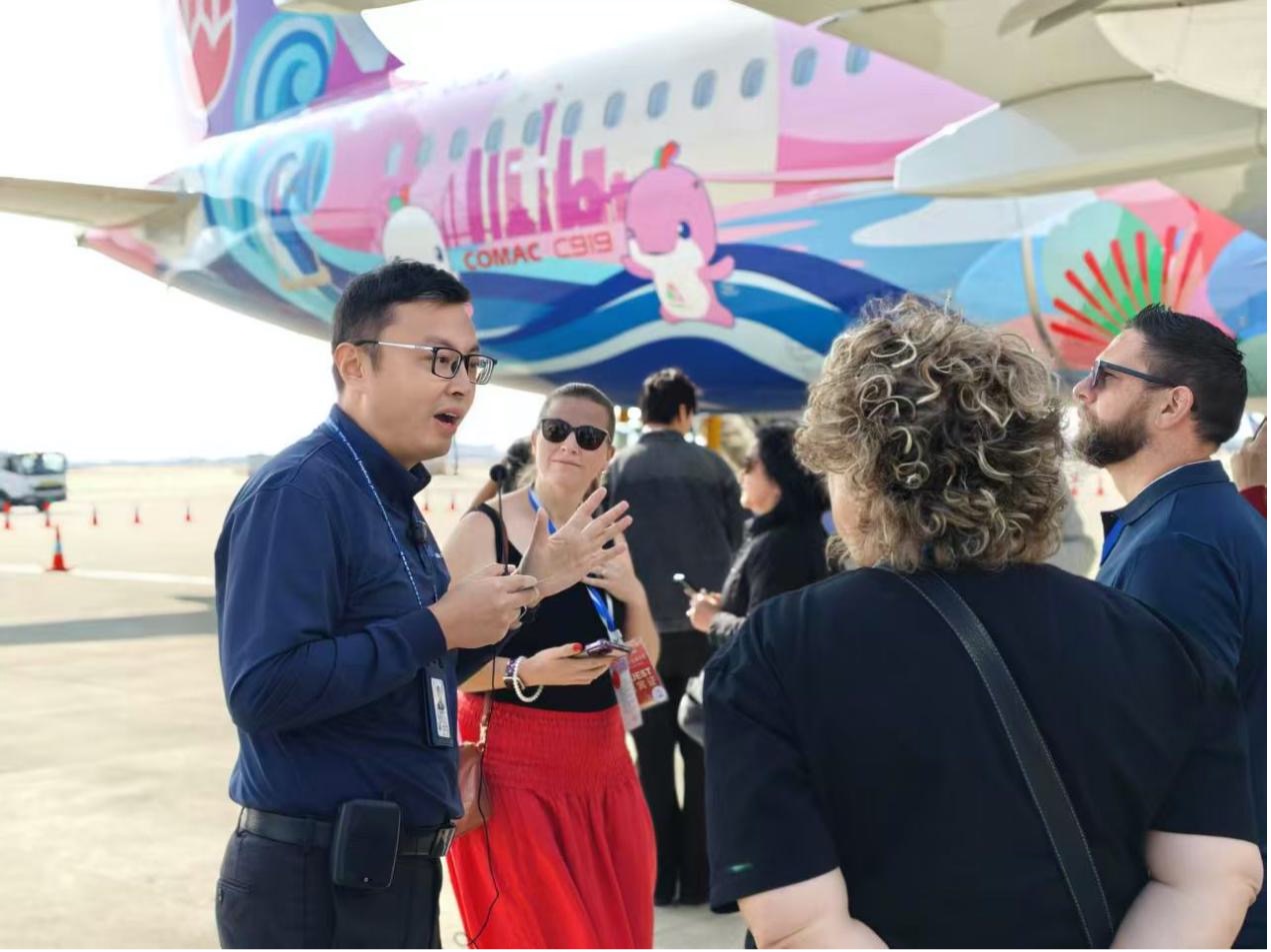 Global influencers visit China's homegrown large passenger jet C919, Guangzhou, south China's Guangdong Province, March 6, 2026. /China Southern Airlines