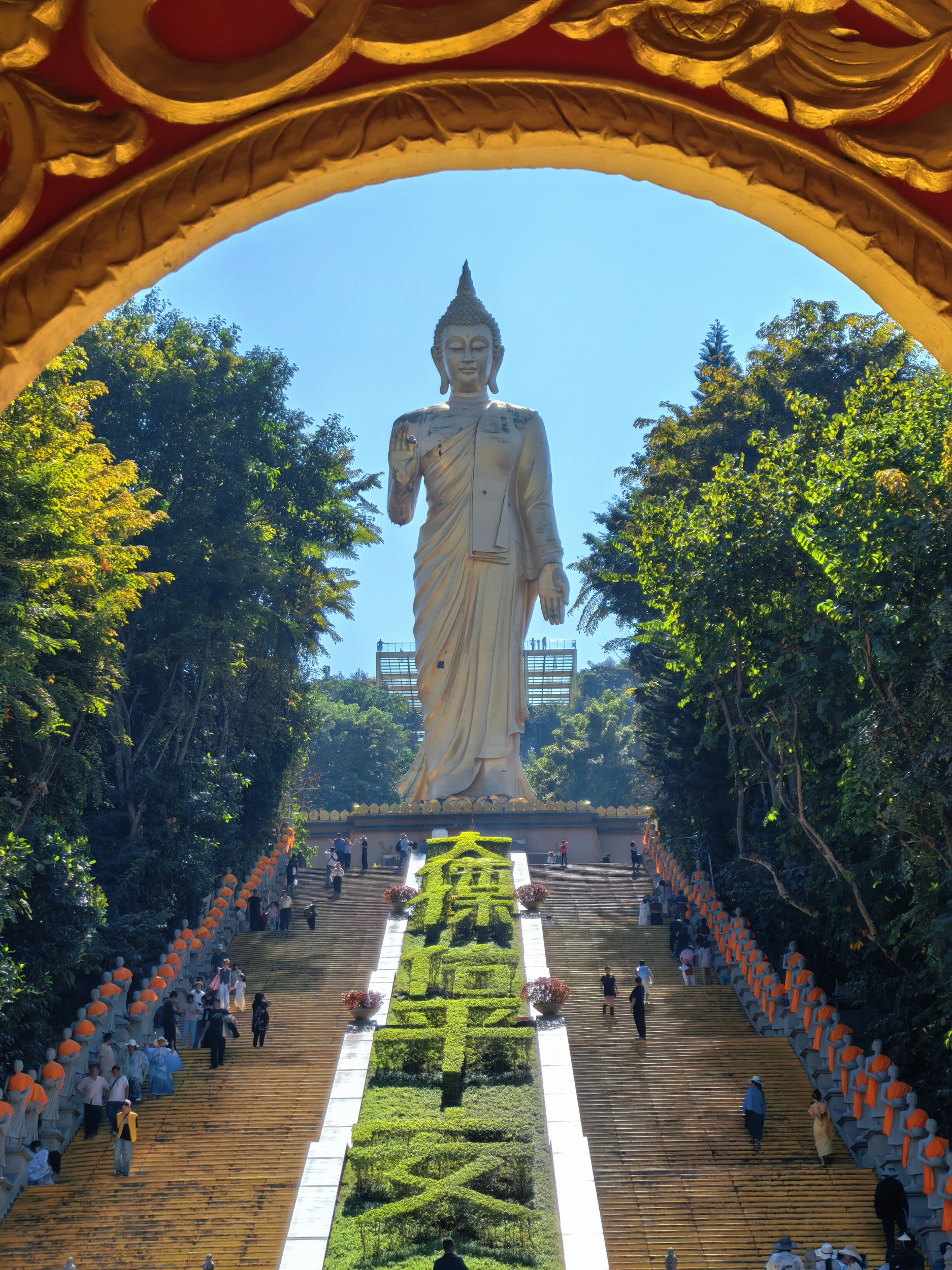 The 49-meter-tall Auspicious Buddha (Sakyamuni) statue of the Mengle Grand Buddhist Temple is seen in Xishuangbanna, southwest China's Yunnan Province on February 6, 2026. /CGTN