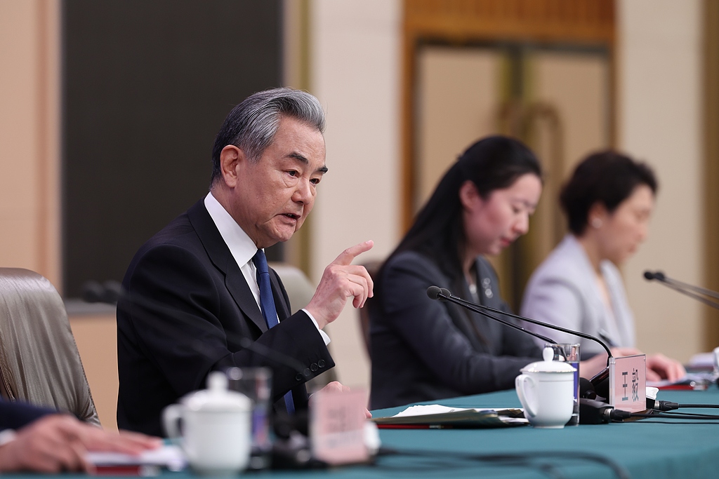 Chinese Foreign Minister Wang Yi attends a press conference on China's foreign policy and external relations on the sidelines of the fourth session of the 14th National People's Congress in Beijing, China, March 8, 2026. /VCG