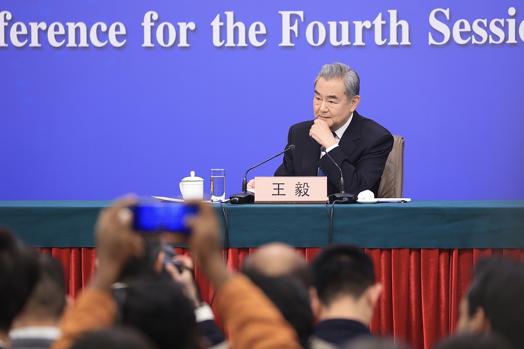 Chinese Foreign Minister Wang Yi attends a press conference on China's foreign policy and external relations on the sidelines of the fourth session of the 14th National People's Congress in Beijing, China, March 8, 2026. /VCG
