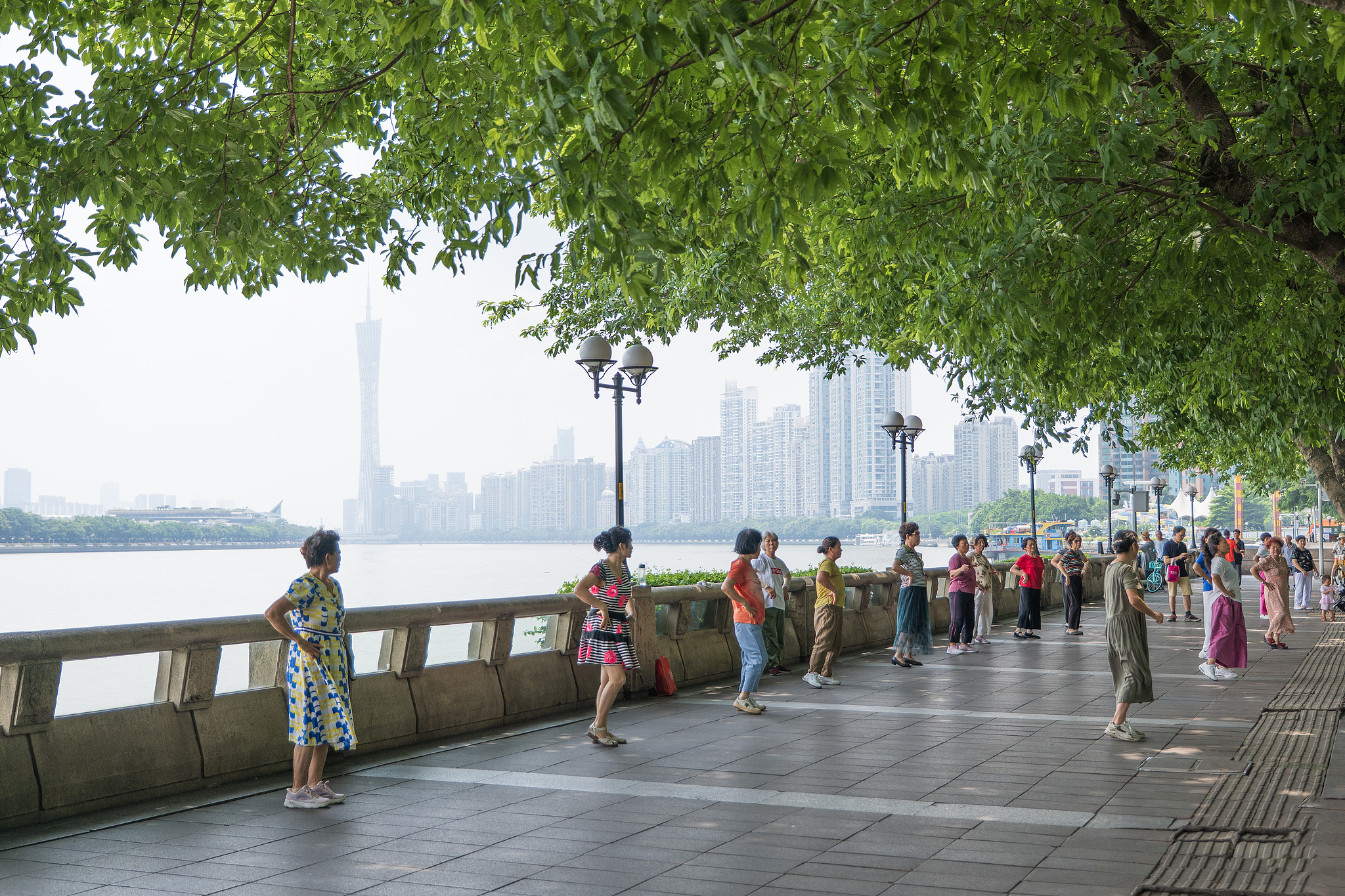 Residents dance in a park in Guangzhou City, south China's Guangdong Province, July 17, 2025. /CFP