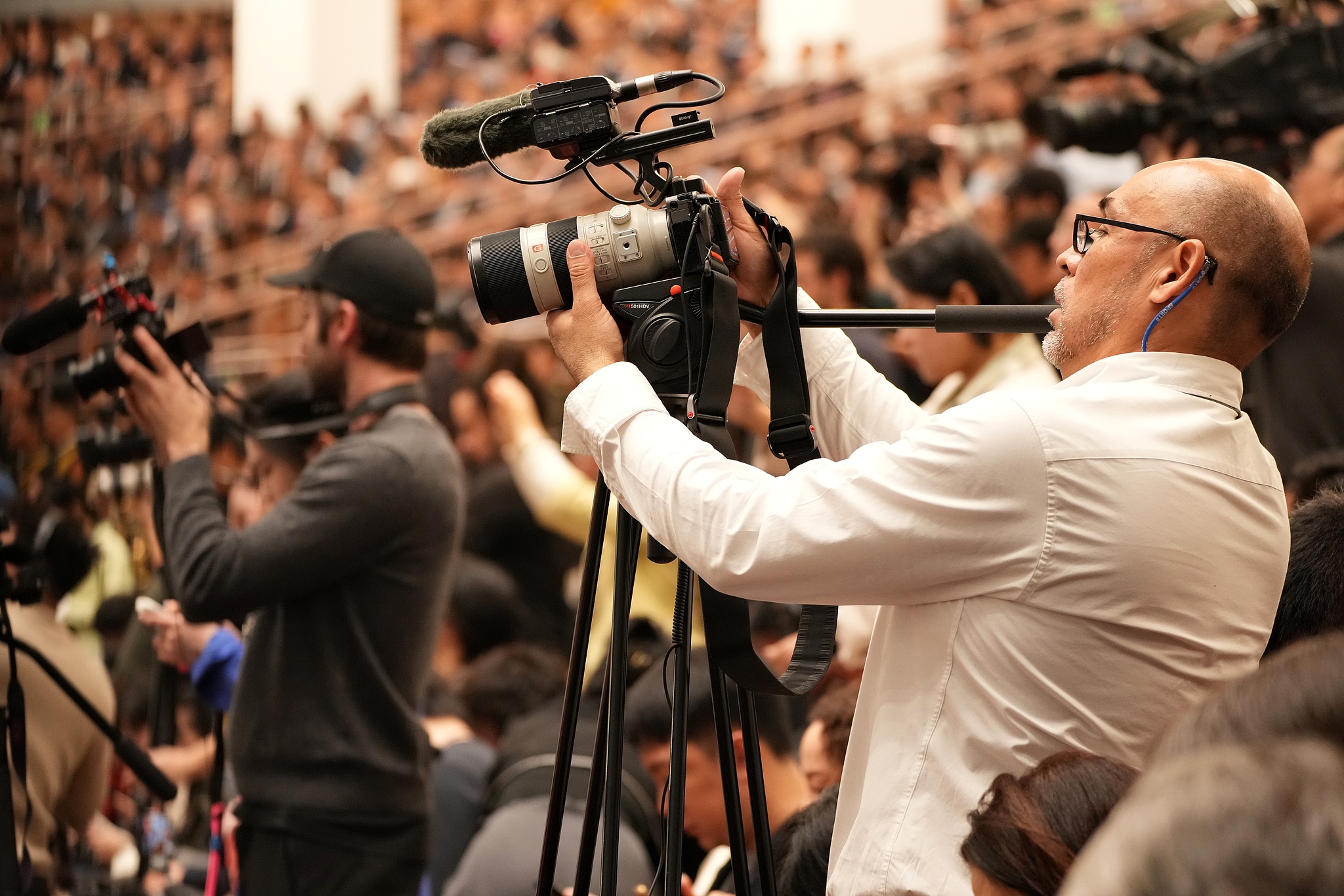Foreign media reporters at the opening meeting of the fourth session of the 14th National People's Congress in Beijing, China, March 5, 2026. /VCG