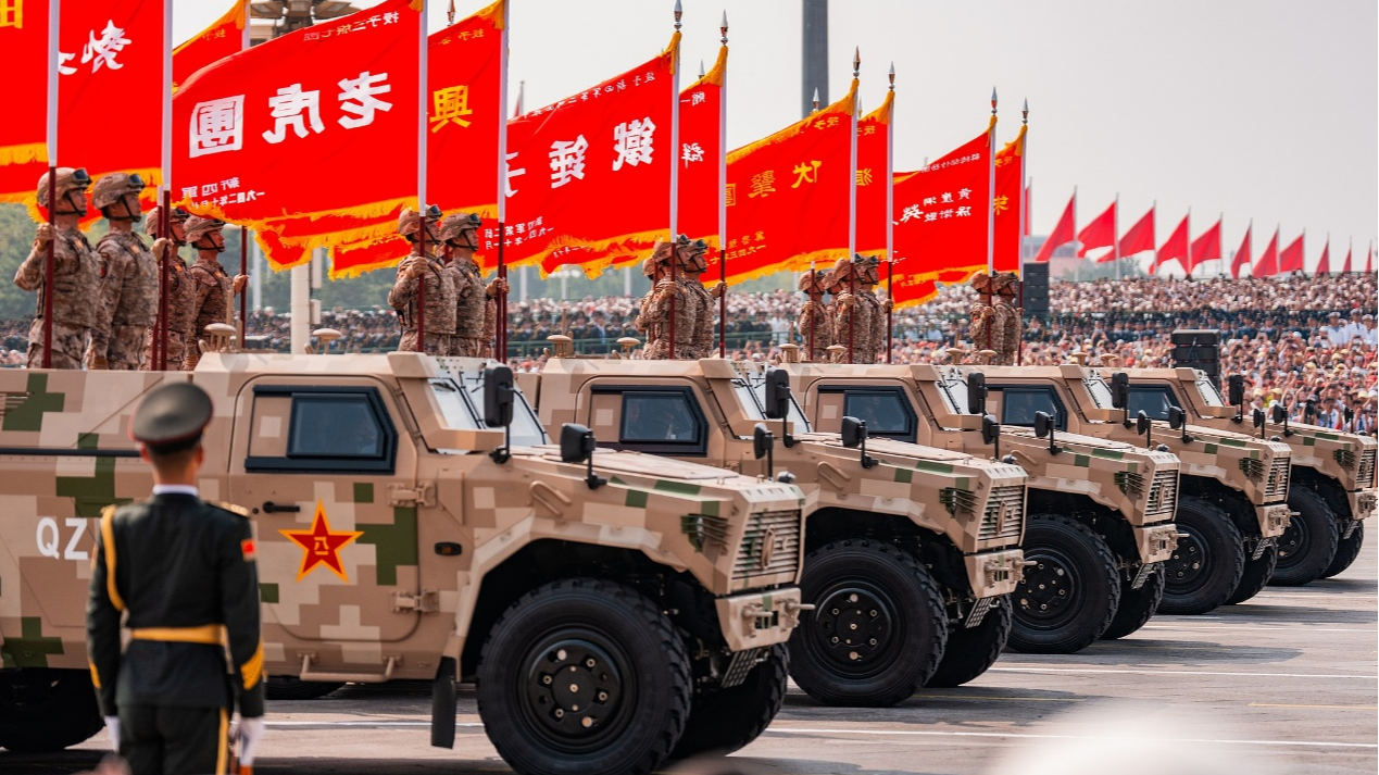 The battle flag formation is reviewed during the grand gathering to commemorate the 80th anniversary of the victory in the Chinese People's War of Resistance against Japanese Aggression and the World Anti-Fascist War, at Tiananmen Square in Beijing, China, September 3, 2025. /CFP