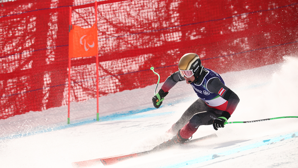 Gold medalist Johannes Aigner of Austria participates in the 2026 Milano Cortina Winter Paralympics men's Alpine skiing Super-G VI competition at the Tofane Alpine Skiing Centre in Cortina d'Ampezzo, Italy, March 9, 2026. /VCG