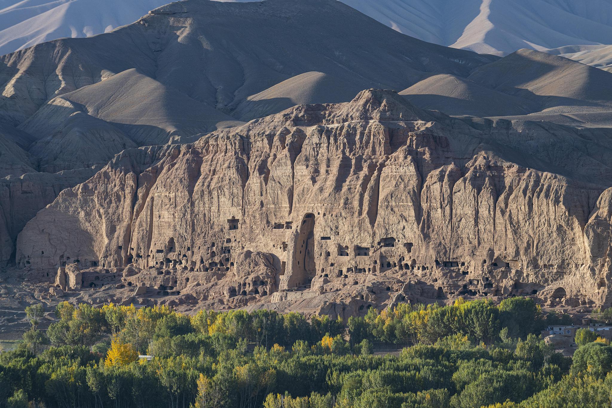 Empty niches in the mountains at the site of the ancient Bamiyan Buddhas are visible following their destruction by the Taliban. /VCG