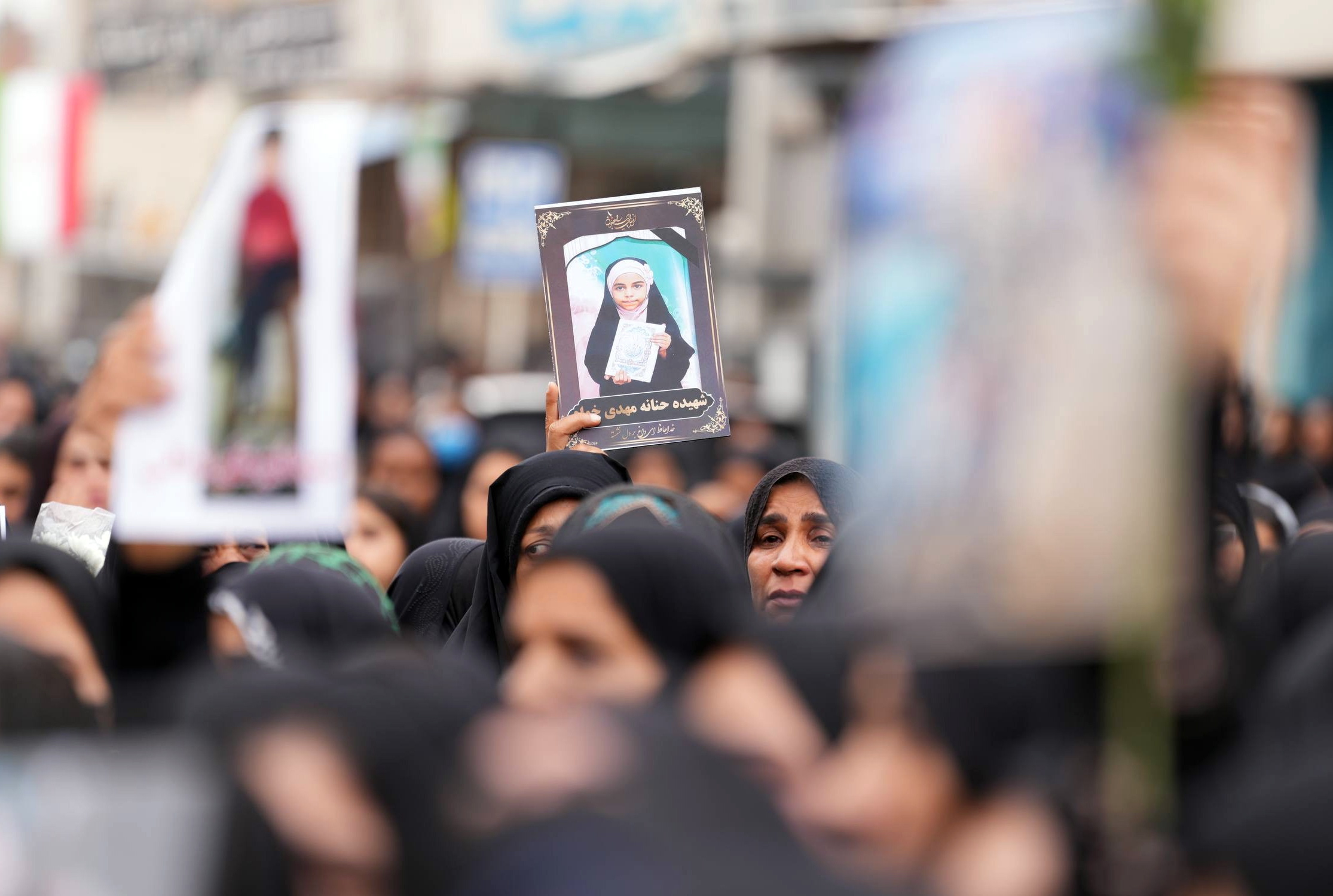 Residents attend a mass funeral for children after US-Israeli airstrikes hit an elementary school in Iran on February 28, 2026, killing at least 165 people, mostly children, in this photo taken on March 3, 2026. /IC 