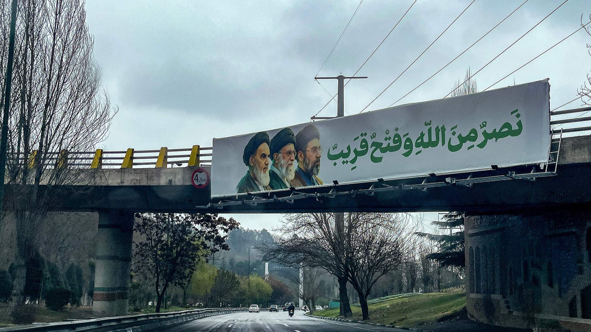 A billboard depicting Iran's supreme leaders since 1979 above a highway in Tehran, March 10, 2026. /VCG