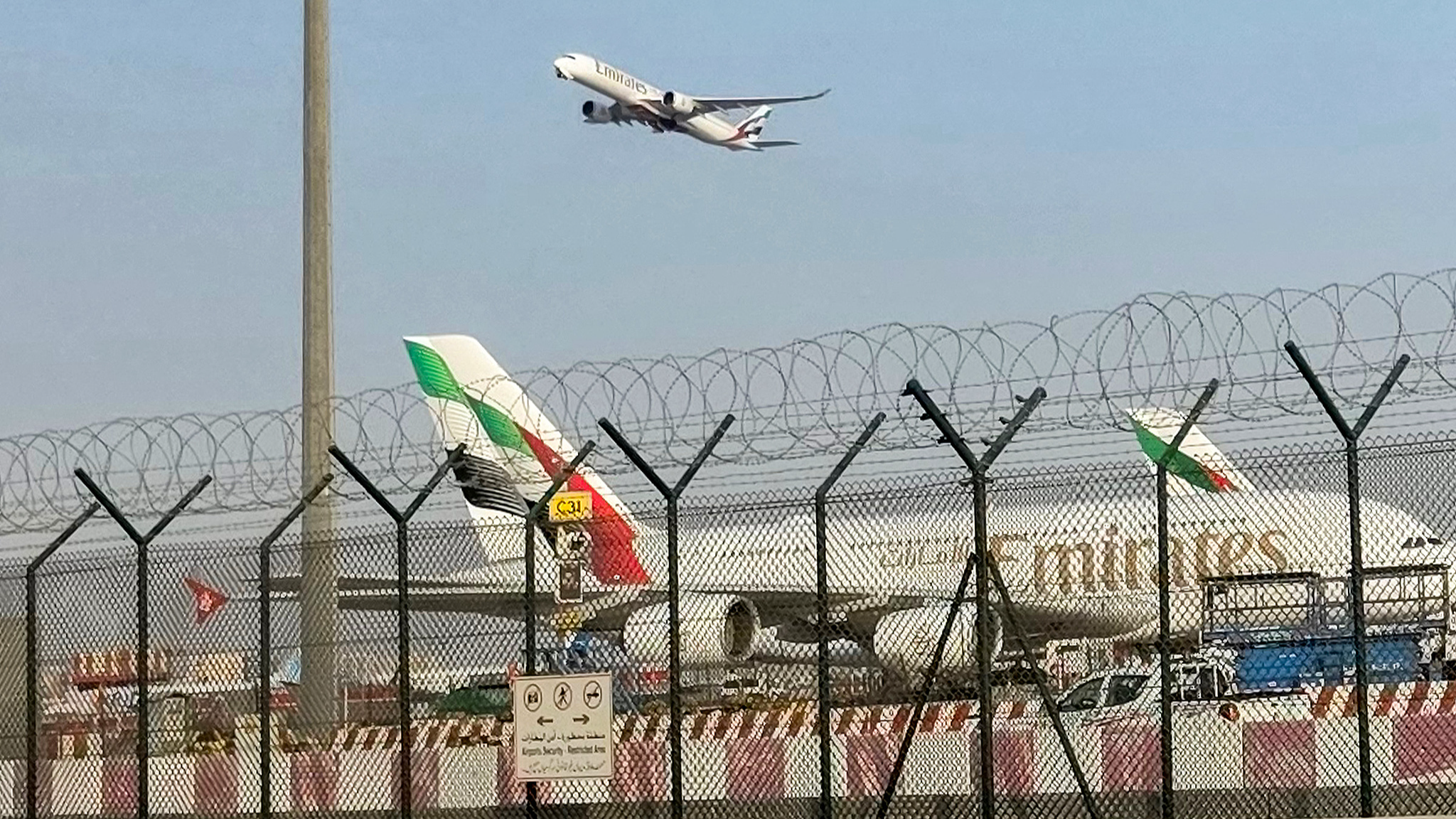 An aircraft takes off from Dubai International Airport in Dubai, the UAE, March 8, 2026. /VCG