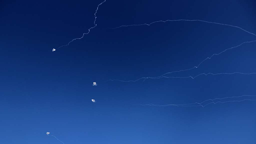 Rocket trails from an interception by Israel's Iron Dome missile defense system are pictured over Tel Aviv, Israel, March 9, 2026. /VCG