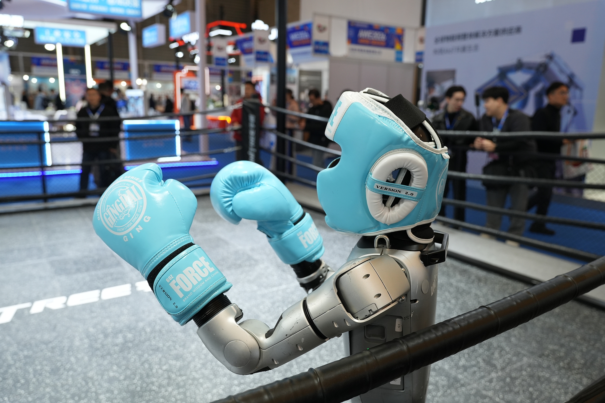A robot boxing in the ring at the AWE, Shanghai, China, March 12, 2026. /VCG