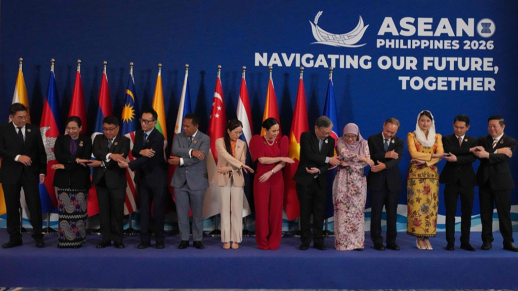Participants at the 32nd ASEAN Economic Ministers' Retreat and Related Meetings take a group photo in Manila, the Philippines, March 13, 2026. /VCG