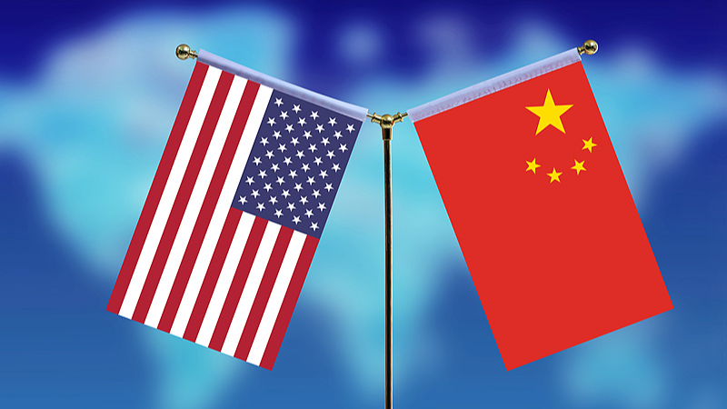 National flags of China (R) and the United States. /VCG