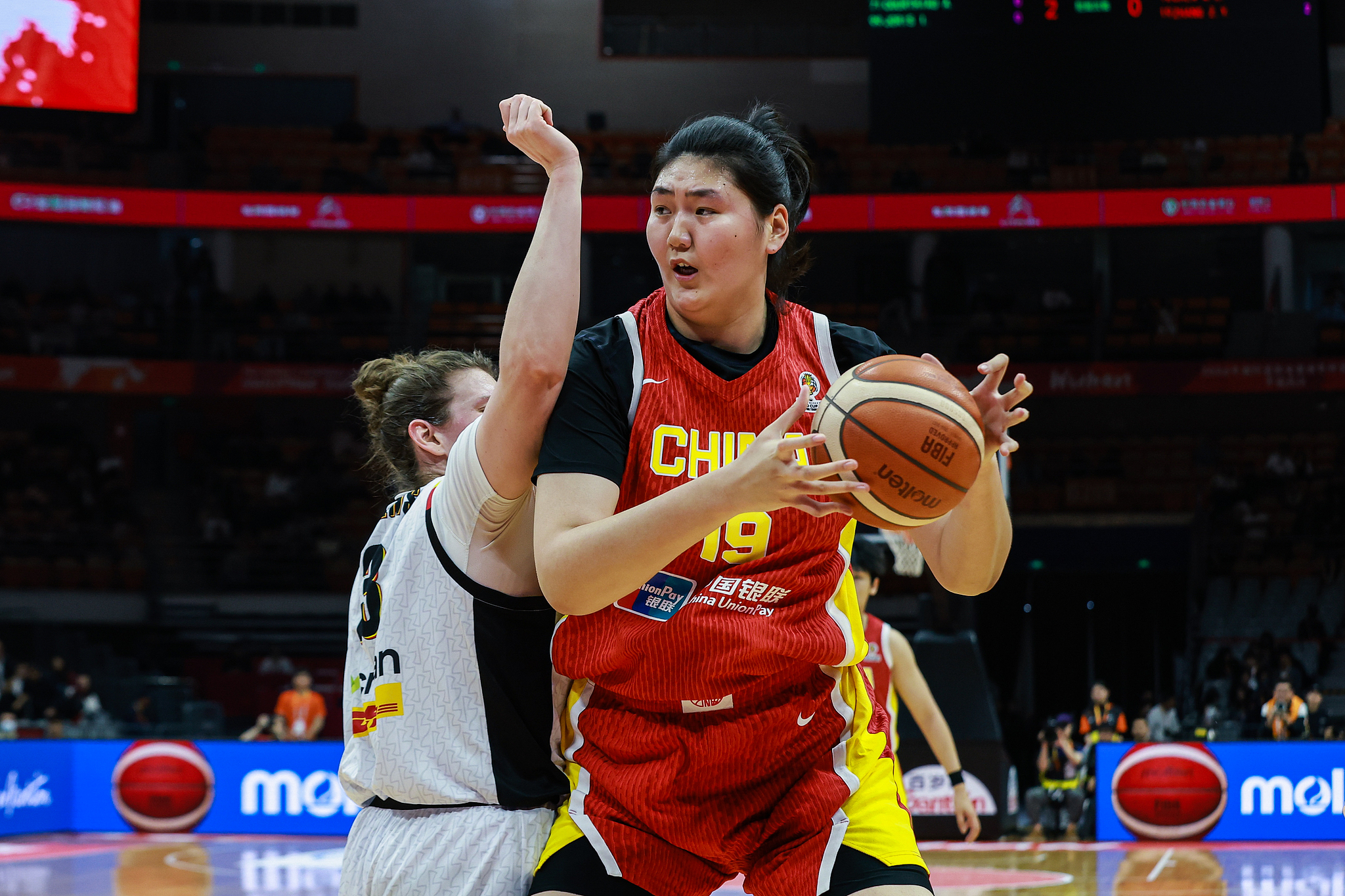 Zhang Ziyu of China controls the ball against Belgium in a 2026 FIBA Women's World Cup Qualifying game in Wuhan, China, March 12, 2026. /VCG