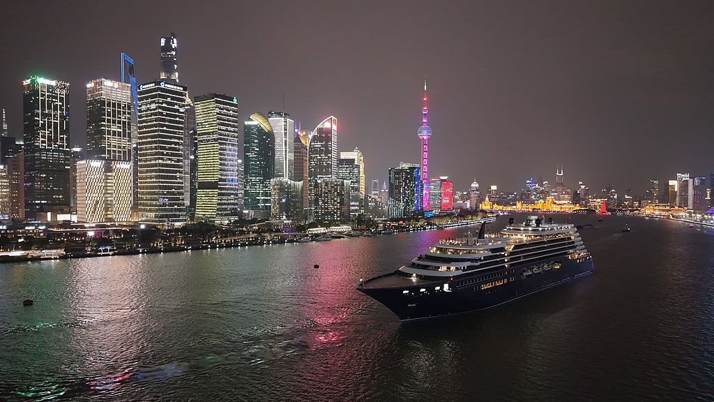 A new ultra-luxury cruise ship made its first visit to the Chinese mainland, docking along the illuminated banks of the Huangpu River in Shanghai on March 11, 2026. /VCG