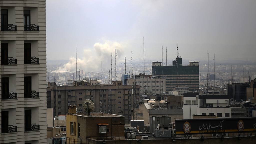 Smoke rises after airstrikes in Tehran, Iran, March 13, 2026. /VCG