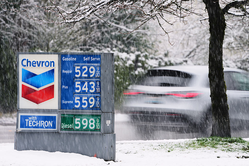 Gas prices are displayed on a sign outside a Chevron gas station in Bellevue, Washington, Friday, March 13, 2026. /VCG