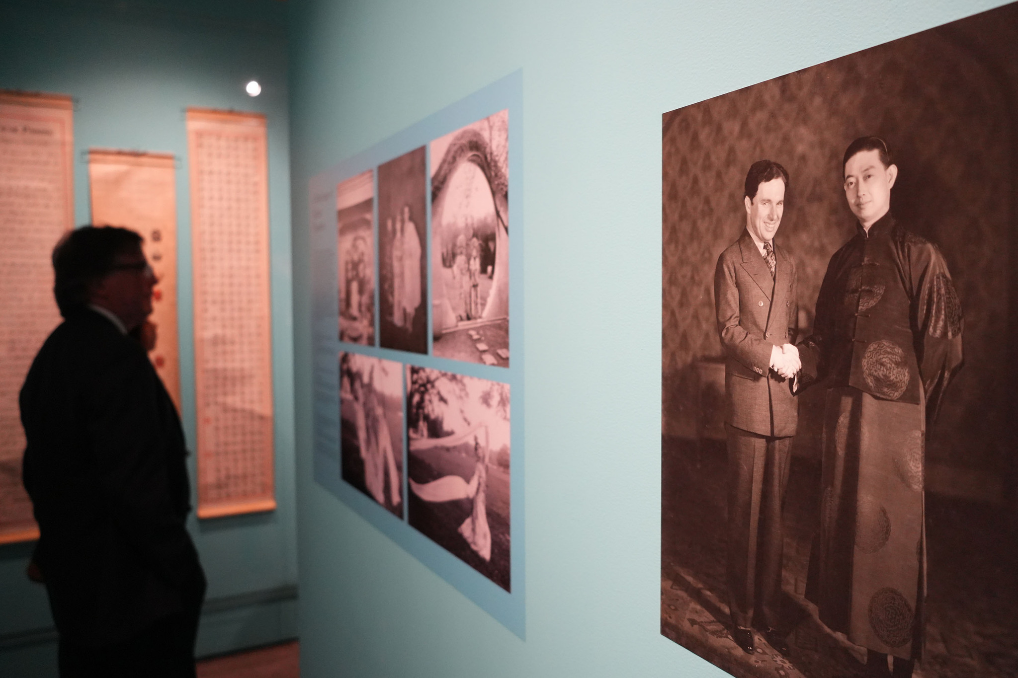 Visitors at the China Institute Gallery in New York on March 11, 2026, view a historic photograph of Mei Lanfang with Charlie Chaplin taken during Mei's visit to Hollywood in 1930. /VCG