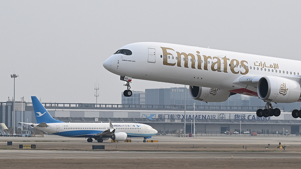 Emirates flight EK310 arrives at Hangzhou Xiaoshan International Airport in Hangzhou, Zhejiang Province, China, March 8, 2026./ VCG