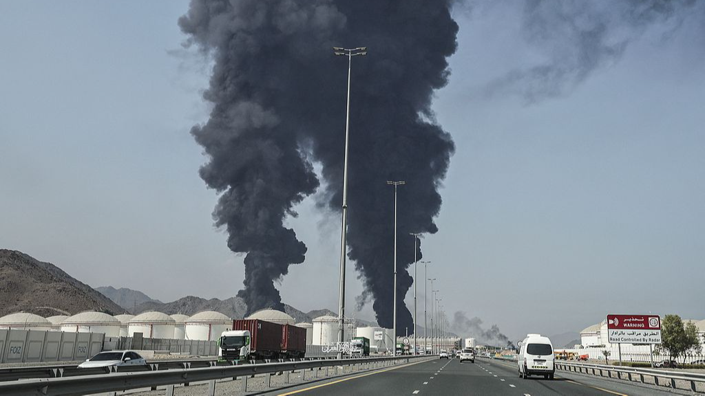 Smoke rises from the direction of an energy installation in the Gulf emirate of Fujairah, the United Arab Emirates, March 14, 2026. /VCG