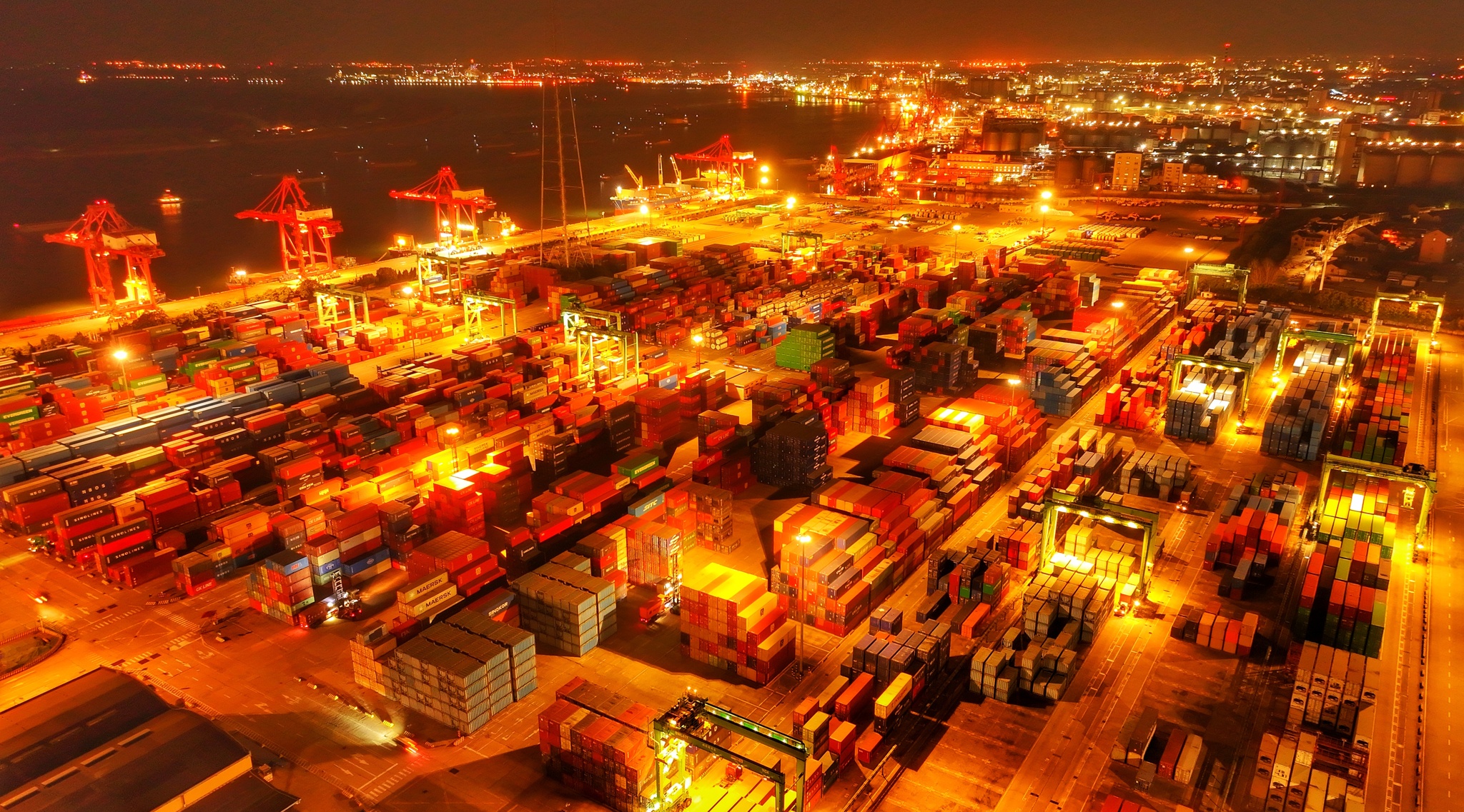 The container terminal in Suzhou Port Area seen brightly illuminated, Suzhou, Jiangsu Province, China, March 10, 2026. /VCG