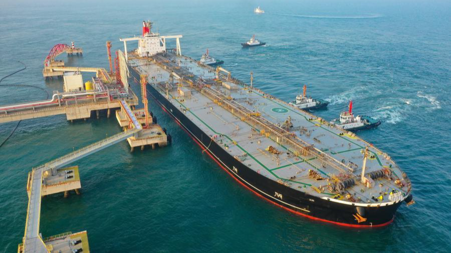 A foreign vessel carrying petrochemical raw materials berths at the Yangpu Port in Danzhou, south China's Hainan Province, December 18, 2025. /Xinhua