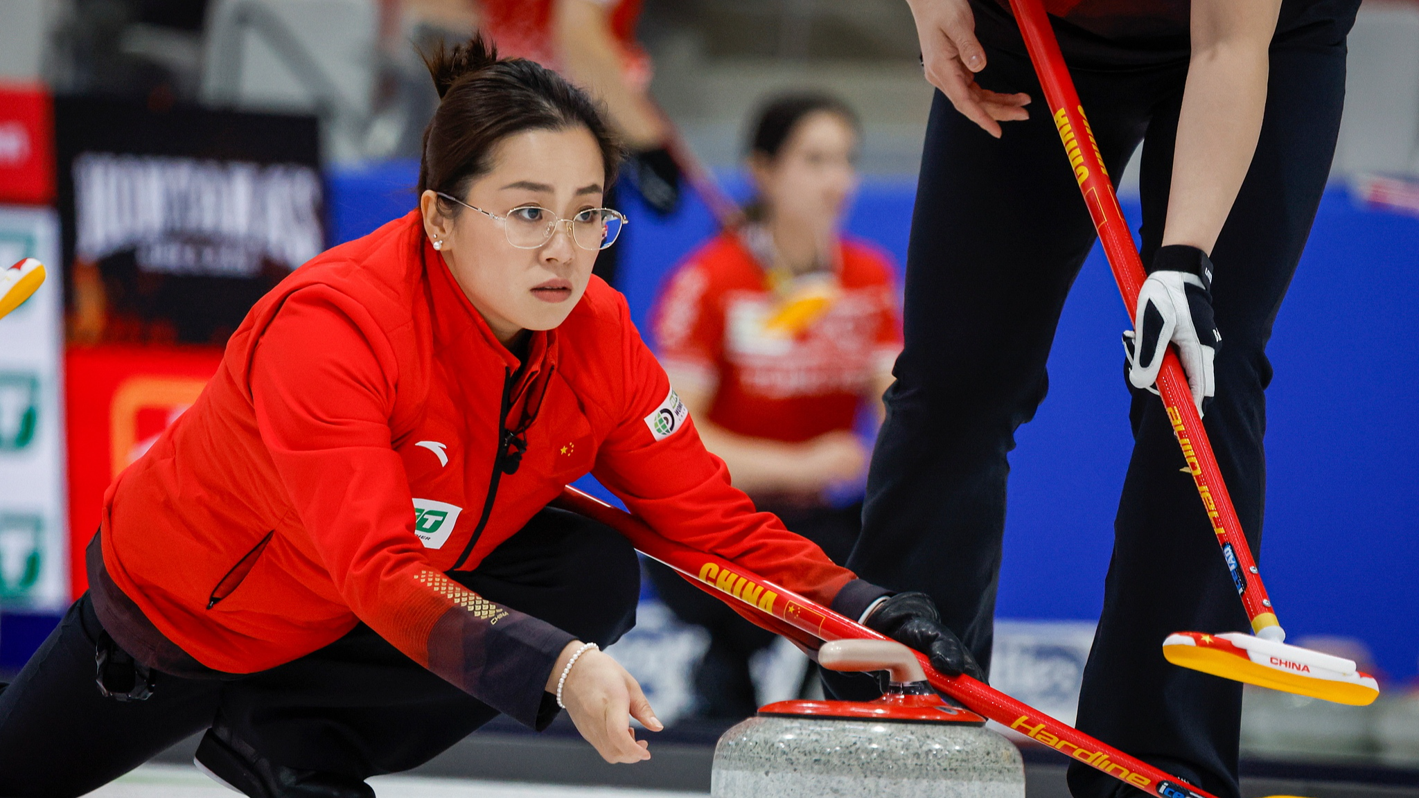 China skip Wang Rui delivers a stone against Italy in a round-robin contest at the World Women's Curling Championship in Calgary, Canada, March 16, 2026. /VCG