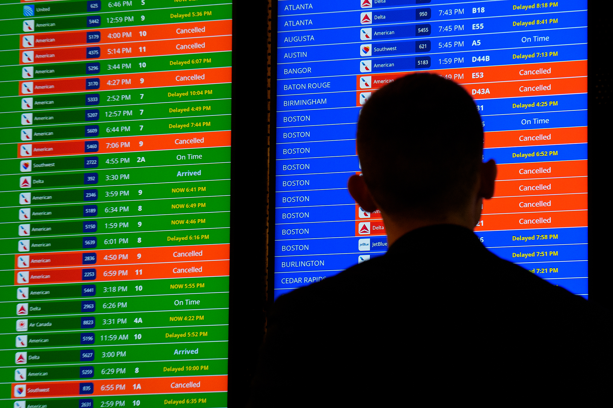 A departure board displaying multiple canceled and delayed flights at Ronald Reagan Washington National Airport in Arlington, Virginia, the US, March 16, 2026. /VCG