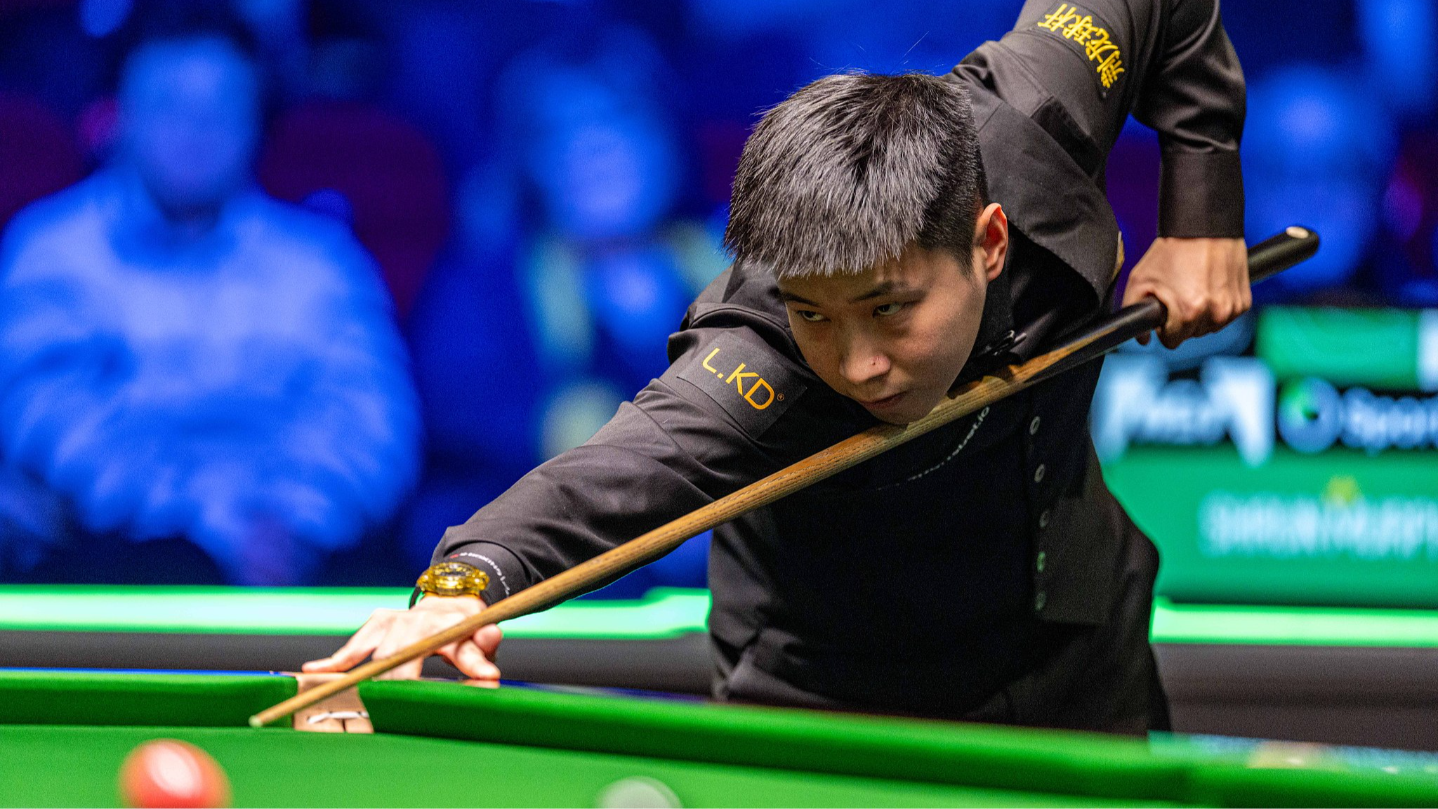 FILE: Zhao Xintong of China takes a shot against Shaun Murphy of England in a quarterfinal match at the WST Players Championship in Telford, England, February 20, 2026. /VCG