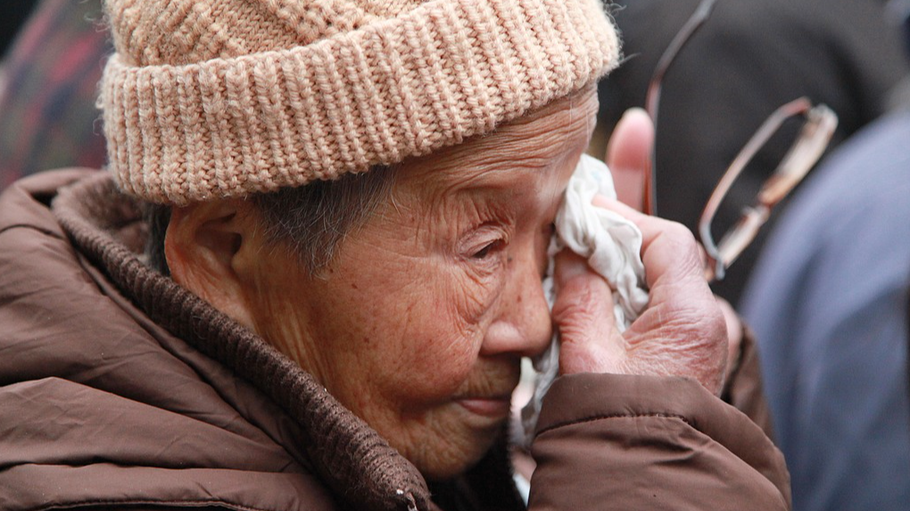 File photo of Guan Shunhua, a survivor of the Nanjing Massacre. /VCG